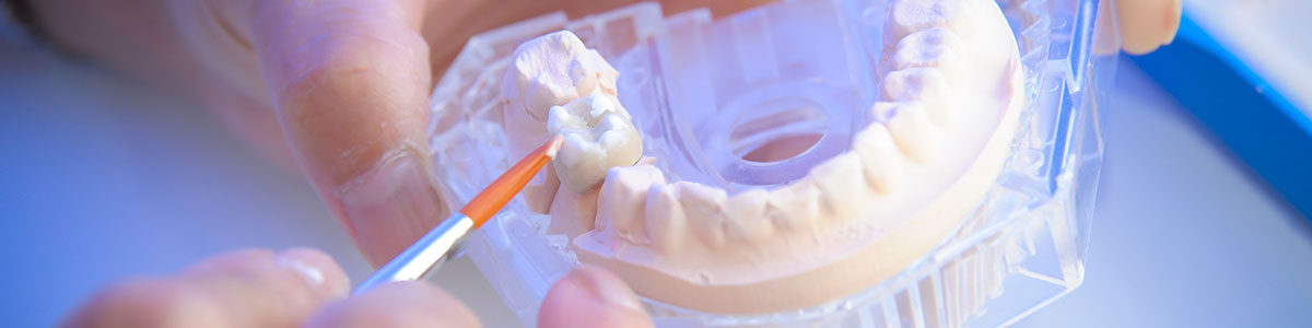 Finishing touches being made to a dental restoration